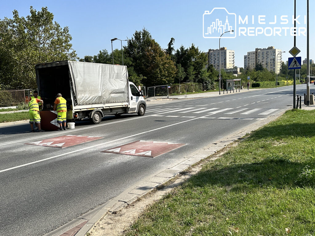 a truck parked on the side of a road