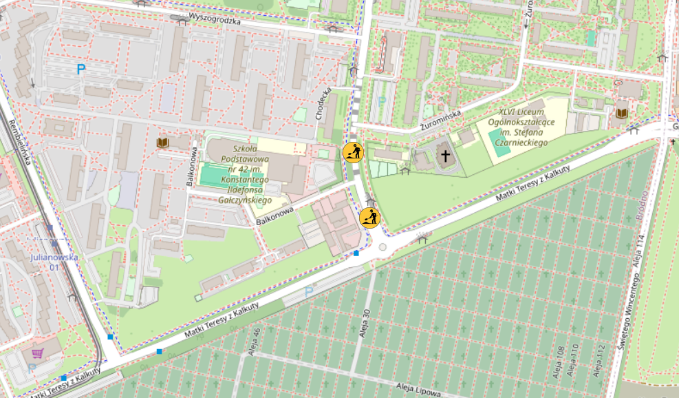 Mapa z oznaczeniami ulic, szkół i obiektów, z wytycznymi dla pieszych i budowy w okolicy.