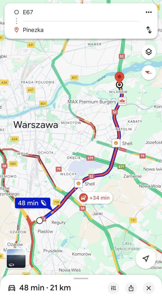 Mapa przedstawiająca trasę E67 z Pinezki do Wilanowa, z informacją o czasie przejazdu 48 minut oraz opóźnieniu 34 minuty.
