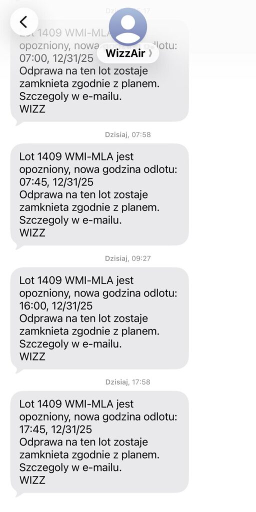 Powiadomienia SMS od WizzAir informujące o opóźnieniach lotu 1409 WMI-MLA oraz nowych godzinach odlotu.