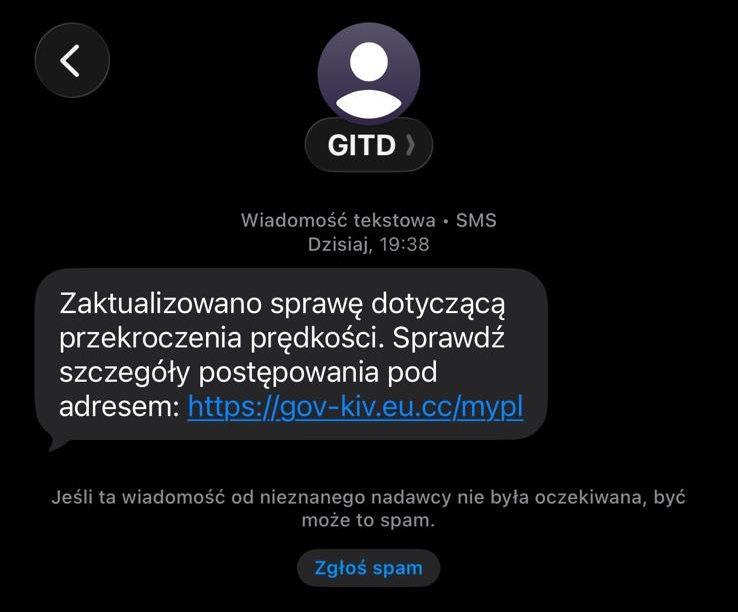Zrzut ekranu wiadomości SMS od nadawcy „GITD” z linkiem do sprawy dotyczącej przekroczenia prędkości i ostrzeżeniem o spamie.